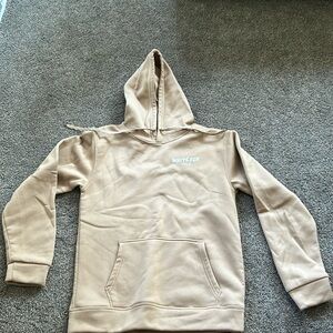 white fox hoodie it’s like cream/ light brown